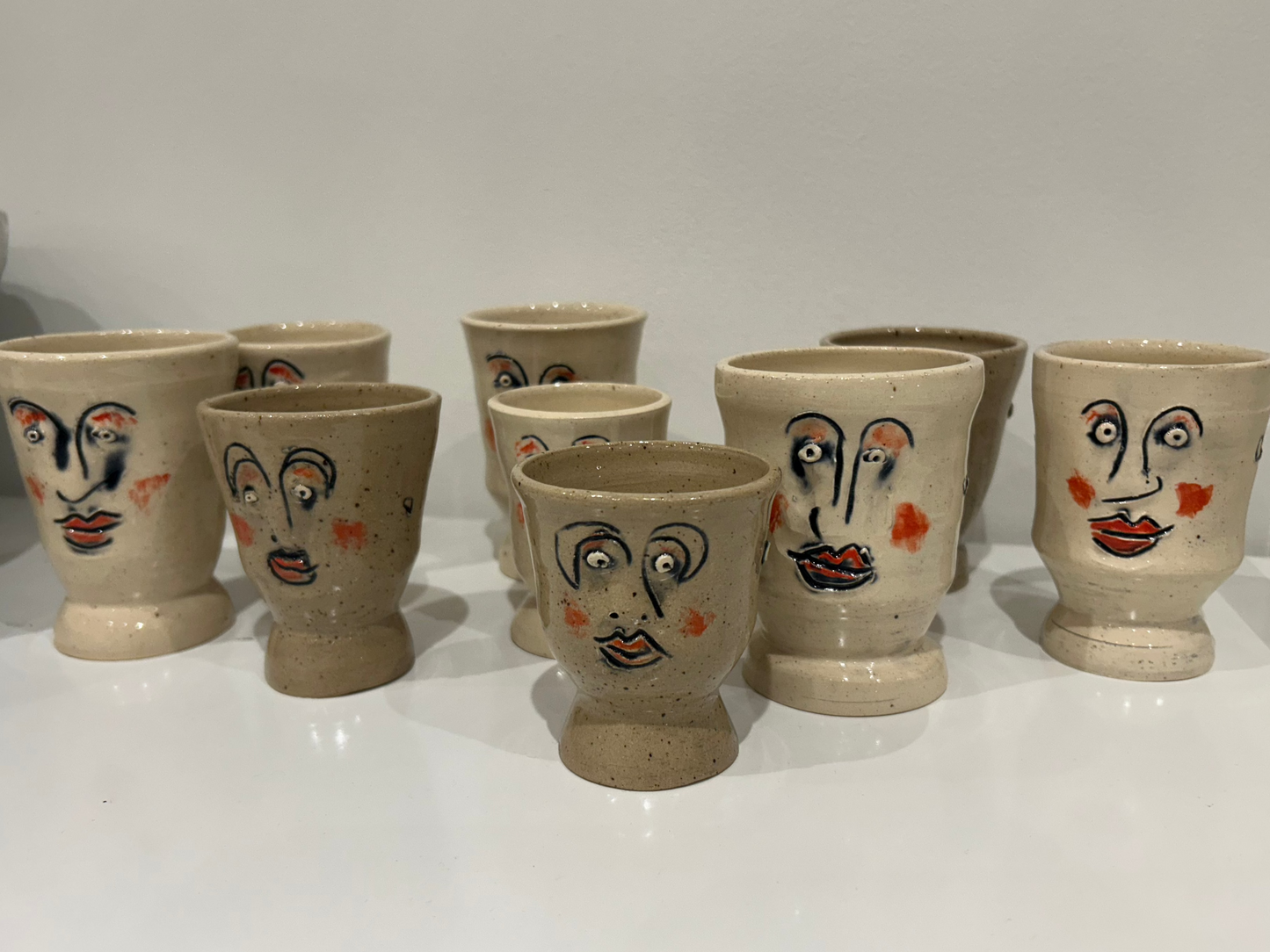 Footed Face Cups